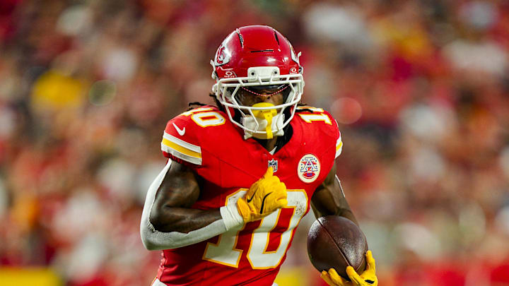 Aug 22, 2025; Kansas City, Missouri, USA; Kansas City Chiefs running back Isiah Pacheco (10) runs the ball during the first half against the Chicago Bears at GEHA Field at Arrowhead Stadium. Mandatory Credit: Jay Biggerstaff-Imagn Images