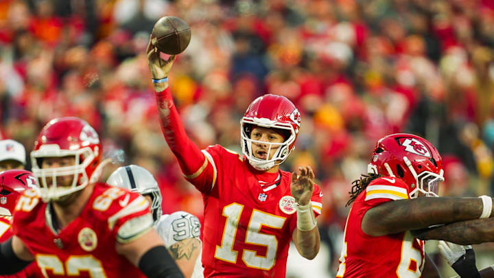 Nov 29, 2024; Kansas City, Missouri, USA; Kansas City Chiefs quarterback Patrick Mahomes (15) throws a pass during the second half against the Las Vegas Raiders at GEHA Field at Arrowhead Stadium. Mandatory Credit: Jay Biggerstaff-Imagn Images