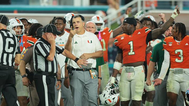 Oct 17, 2026; Miami Gardens, Florida, USA;  Miami Hurricanes head coach Mario Cristobal reacts after a play during overtime against the Florida State Seminoles at Hard Rock Stadium.  Mandatory Credit: Sam Navarro-Imagn Images