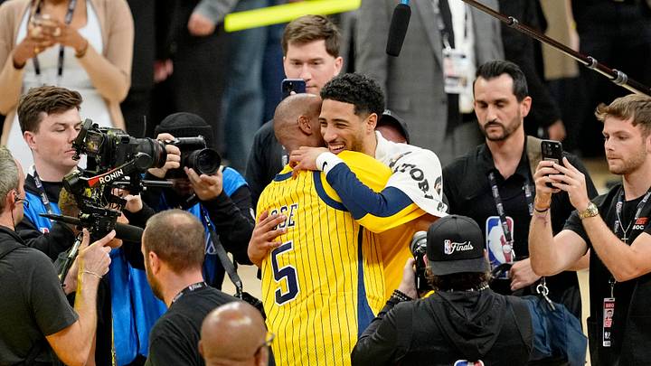 Jun 19, 2025; Indianapolis, Indiana, USA; Reggie Miller hugs Indiana Pacers guard Bennedict Mathurin (00) after winning game six of the 2025 NBA Finals between the Oklahoma City Thunder and the Indiana Pacers at Gainbridge Fieldhouse. Mandatory Credit: Kyle Terada-Imagn Images Jun 19, 2025; Indianapolis, Indiana, USA; Reggie Miller hugs Indiana Pacers guard Bennedict Mathurin (00) after winning game six of the 2025 NBA Finals between the Oklahoma City Thunder and the Indiana Pacers at Gainbridge Fieldhouse. Mandatory Credit: Kyle Terada-Imagn Images