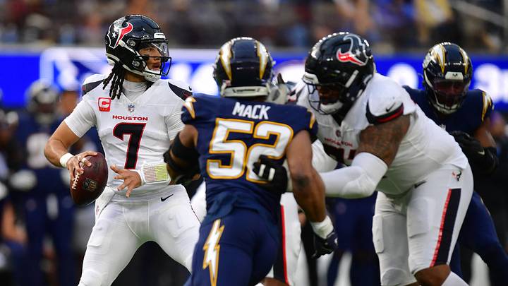Dec 27, 2025; Inglewood, California, USA; Houston Texans quarterback C.J. Stroud (7) stands in the pocket as Los Angeles Chargers linebacker Khalil Mack (52) applies the pressure during the first half at SoFi Stadium. Mandatory Credit: Gary A. Vasquez-Imagn Images Dec 27, 2025; Inglewood, California, USA; Houston Texans quarterback C.J. Stroud (7) stands in the pocket as Los Angeles Chargers linebacker Khalil Mack (52) applies the pressure during the first half at SoFi Stadium. Mandatory Credit: Gary A. Vasquez-Imagn Images