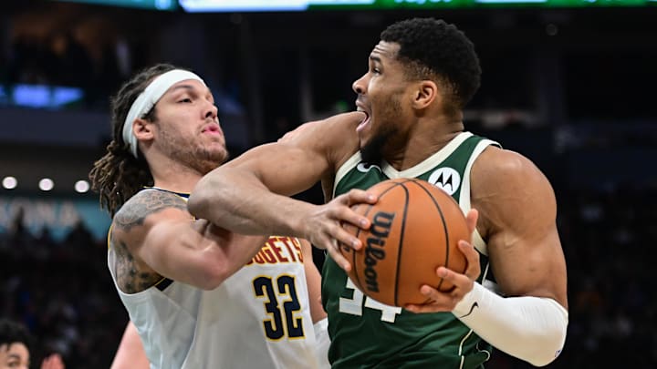 Feb 27, 2025; Milwaukee, Wisconsin, USA; Milwaukee Bucks forward Giannis Antetokounmpo (34) looks for a shot against Denver Nuggets forward Aaron Gordon (32) in the second quarter at Fiserv Forum. Mandatory Credit: Benny Sieu-Imagn Images Feb 27, 2025; Milwaukee, Wisconsin, USA; Milwaukee Bucks forward Giannis Antetokounmpo (34) looks for a shot against Denver Nuggets forward Aaron Gordon (32) in the second quarter at Fiserv Forum. Mandatory Credit: Benny Sieu-Imagn Images