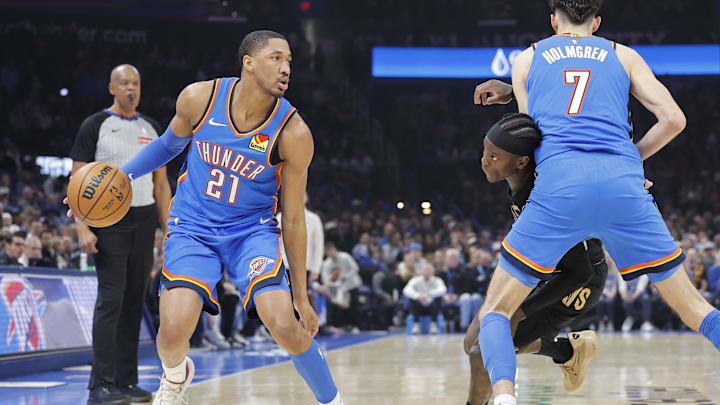 Feb 22, 2026; Oklahoma City, Oklahoma, USA; Oklahoma City Thunder guard Aaron Wiggins (21) moves the ball down the court against the Cleveland Cavaliers during the first quarter at Paycom Center. Mandatory Credit: Alonzo Adams-Imagn Images