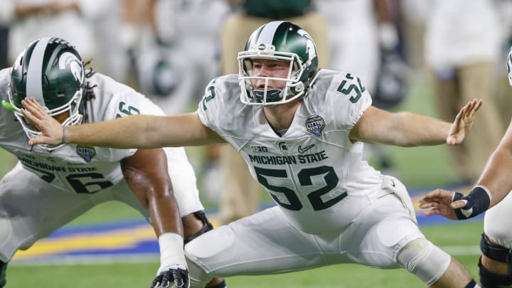 Dec 31, 2015; Arlington, TX, USA; Michigan State Spartans long snapper Taybor Pepper (52) before the game against the Alabama Crimson Tide in the 2015 CFP semifinal at the Cotton Bowl at AT&T Stadium. Mandatory Credit: Kevin Jairaj-USA TODAY Sports