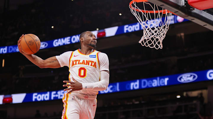 Mar 1, 2026; Atlanta, Georgia, USA; Atlanta Hawks forward Jonathan Kuminga (0) dunks against the Portland Trail Blazers in the fourth quarter at State Farm Arena. Mandatory Credit: Brett Davis-Imagn Images
Mar 1, 2026; Atlanta, Georgia, USA; Atlanta Hawks forward Jonathan Kuminga (0) dunks against the Portland Trail Blazers in the fourth quarter at State Farm Arena. Mandatory Credit: Brett Davis-Imagn Images