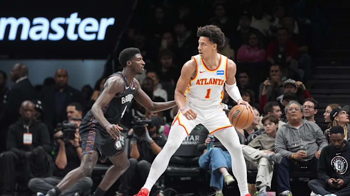 Apr 3, 2026; Brooklyn, New York, USA; Atlanta Hawks forward Jalen Johnson (1) dribbles the ball against Brooklyn Nets guard Drake Powell (4) during the first half at Barclays Center. Mandatory Credit: Gregory Fisher-Imagn Images Apr 3, 2026; Brooklyn, New York, USA; Atlanta Hawks forward Jalen Johnson (1) dribbles the ball against Brooklyn Nets guard Drake Powell (4) during the first half at Barclays Center. Mandatory Credit: Gregory Fisher-Imagn Images