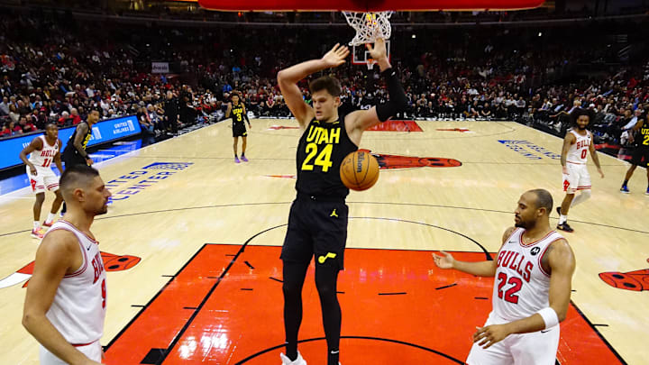 Nov 4, 2024; Chicago, Illinois, USA; Utah Jazz center Walker Kessler (24) dunks the ball against Chicago Bulls forward Talen Horton-Tucker (22) during the second half at United Center. Mandatory Credit: David Banks-Imagn Images