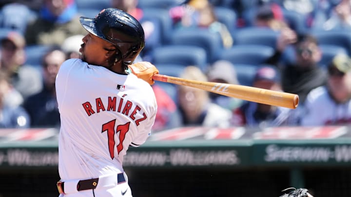Apr 25, 2024; Cleveland, Ohio, USA; Cleveland Guardians designated hitter Jose Ramirez (11) hits a grand slam during the second inning against the Boston Red Sox at Progressive Field. Mandatory Credit: Ken Blaze-USA TODAY Sports