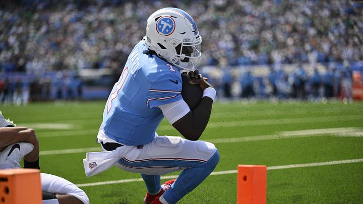 Sep 20, 2026; Nashville, Tennessee, USA;  Tennessee Titans quarterback Cam Ward (1) runs the ball to the goal line during the second quarter at Nissan Stadium.  Mandatory Credit: Steve Roberts-Imagn Images