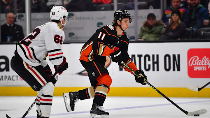 Feb 27, 2023; Anaheim, California, USA; Anaheim Ducks center Trevor Zegras (11) moves the puck ahead