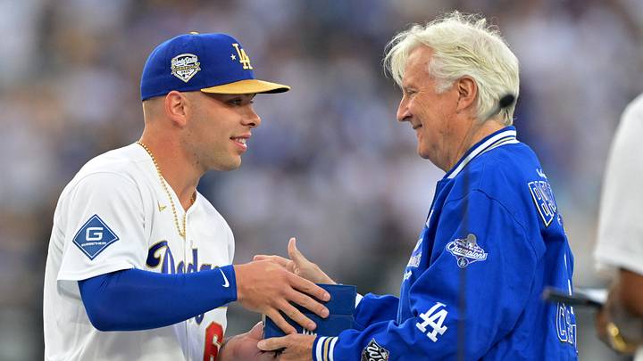 Los Angeles Dodgers catcher Dalton Rushing (68) receives his World Series ring from team owner Mark Walter prior to the game against the Arizona Diamondbacks at Dodger Stadium on March 27, 2026. Los Angeles Dodgers catcher Dalton Rushing (68) receives his World Series ring from team owner Mark Walter prior to the game against the Arizona Diamondbacks at Dodger Stadium on March 27, 2026.
