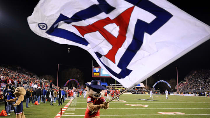 Dec 20, 2008; Las Vegas, NV, USA; Arizona Wildcats mascot Wilbur Wildcat waves an Arizona flag during the Wildcats' 31-21 victory over the Brigham Young Cougars in the Las Vegas Bowl at Sam Boyd Stadium. Mandatory Credit: Kirby Lee/Image of Sport-Imagn Images