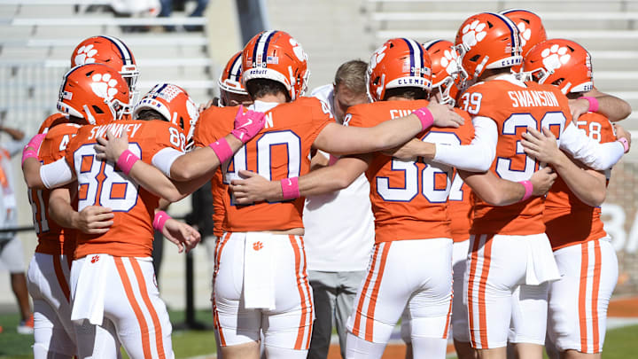 Oct 19, 2024; Clemson, South Carolina, USA; Clemson Tigers huddle prior to the game against the Virginia Cavaliers at Memorial Stadium. Mandatory Credit: Alexander Hicks-Imagn Images