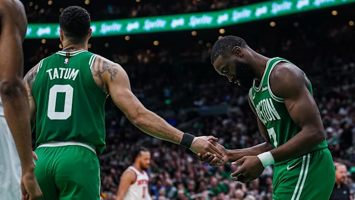 May 7, 2025; Boston, Massachusetts, USA; Boston Celtics guard Jaylen Brown (7) reacts after missing a pass from Boston Celtics forward Jayson Tatum (0) against the New York Knicks in the second half during game two of the second round for the 2025 NBA Playoffs at TD Garden. Mandatory Credit: David Butler II-Imagn Images