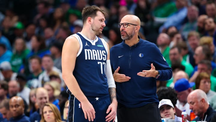 Mar 17, 2024; Dallas, Texas, USA;  Dallas Mavericks head coach Jason Kidd speaks to Dallas Mavericks guard Luka Doncic (77) during the second half against the Denver Nuggets at American Airlines Center. Mandatory Credit: Kevin Jairaj-USA TODAY Sports