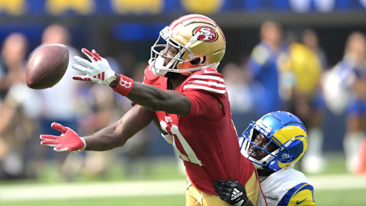 Sep 22, 2024; Inglewood, California, USA; Los Angeles Rams cornerback Tre'Davious White (27) defends San Francisco 49ers wide receiver Brandon Aiyuk (11) on a pass play in the first half at SoFi Stadium. Mandatory Credit: Jayne Kamin-Oncea-Imagn Images Sep 22, 2024; Inglewood, California, USA; Los Angeles Rams cornerback Tre'Davious White (27) defends San Francisco 49ers wide receiver Brandon Aiyuk (11) on a pass play in the first half at SoFi Stadium. Mandatory Credit: Jayne Kamin-Oncea-Imagn Images