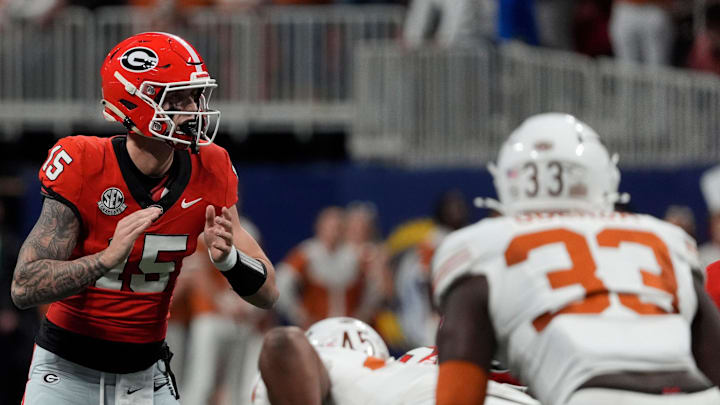 Georgia quarterback Carson Beck (15) gets set to run a play during the first half of the SEC championship game against Texas in Atlanta, on Saturday, Dec. 7, 2024. Georgia quarterback Carson Beck (15) gets set to run a play during the first half of the SEC championship game against Texas in Atlanta, on Saturday, Dec. 7, 2024.