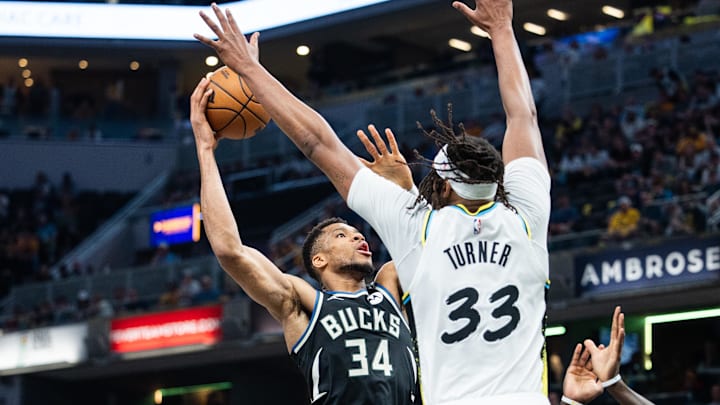 Apr 22, 2025; Indianapolis, Indiana, USA; Milwaukee Bucks forward Giannis Antetokounmpo (34) shoots the ball while Indiana Pacers center Myles Turner (33)  defends during game two of first round for the 2024 NBA Playoffs at Gainbridge Fieldhouse. Mandatory Credit: Trevor Ruszkowski-Imagn Images