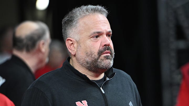 Mar 1, 2025; Lincoln, Nebraska, USA;  Nebraska Cornhuskers football coach Matt Rhule watches the game between the Nebraska Cornhuskers and the Minnesota Golden Gophers during the first half at Pinnacle Bank Arena. Mandatory Credit: Steven Branscombe-Imagn Images