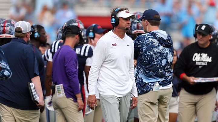 Oct 26, 2024; Oxford, Mississippi, USA; Mississippi Rebels head coach Lane Kiffin watches during a time out during the second half against the Oklahoma Sooners at Vaught-Hemingway Stadium. Mandatory Credit: Petre Thomas-Imagn Images