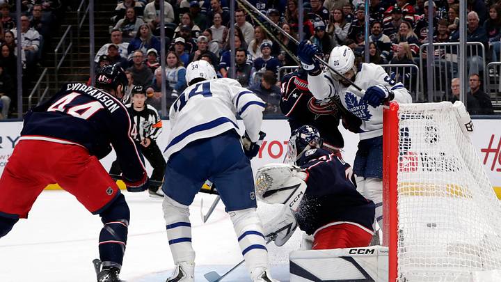 Oct 20, 2026; Columbus, Ohio, USA;  Toronto Maple Leafs right wing Kirill Marchenko (86) deflects the puck past Columbus Blue Jackets goalie Jet Greaves (73) for a goal during the first period at Nationwide Arena.  Mandatory Credit: Russell LaBounty-Imagn Images
