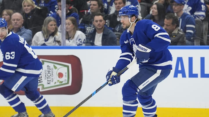 Dec 27, 2025; Toronto, Ontario, CAN; Toronto Maple Leafs defenseman Chris Tanev (8) passes the puck against the Ottawa Senators during the second period at Scotiabank Arena. Mandatory Credit: John E. Sokolowski-Imagn Images Dec 27, 2025; Toronto, Ontario, CAN; Toronto Maple Leafs defenseman Chris Tanev (8) passes the puck against the Ottawa Senators during the second period at Scotiabank Arena. Mandatory Credit: John E. Sokolowski-Imagn Images