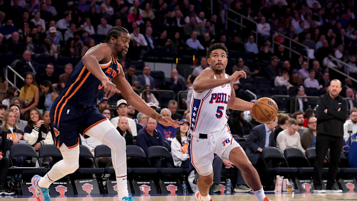 Feb 26, 2025; New York, New York, USA; Philadelphia 76ers guard Quentin Grimes (5) drives to the basket against New York Knicks center Ariel Hukporti (55) during the third quarter at Madison Square Garden. Mandatory Credit: Brad Penner-Imagn Images