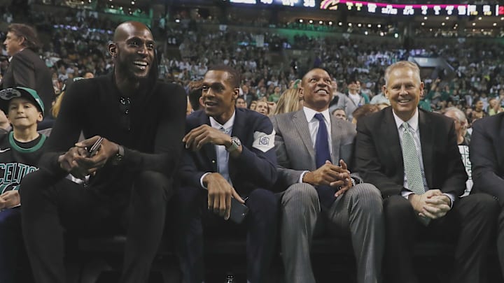 Feb 11, 2018; Boston, MA, USA; Former Boston Celtics (left to right) Kevin Garnett, Rajon Rondo, coach Doc Rivers and current general manager Danny Ainge look on during the second quarter of the game between the Boston Celtics and the Cleveland Cavaliers at TD Garden. Mandatory Credit: Winslow Townson-Imagn Images