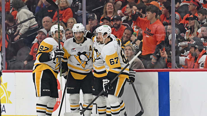 Apr 25, 2026; Philadelphia, Pennsylvania, USA; Pittsburgh Penguins defenseman Kris Letang (58) celebrates his goal with teammates against the Philadelphia Flyers during the third period in game four of the first round of the 2026 Stanley Cup Playoffs at Xfinity Mobile Arena. Mandatory Credit: Eric Hartline-Imagn Images