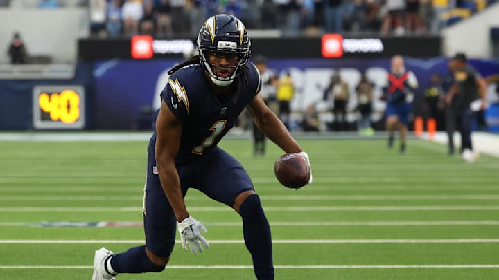 Dec 27, 2025; Inglewood, California, USA;  Los Angeles Chargers wide receiver Quentin Johnston (1) reacts after making a 60-yard reception against the Houston Texans during the first half at SoFi Stadium. Mandatory Credit: Kiyoshi Mio-Imagn Images