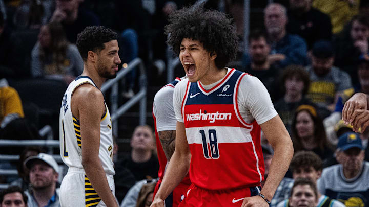 Apr 8, 2025; Indianapolis, Indiana, USA; Washington Wizards forward Kyshawn George (18) celebrates a made basket in the first half against the Indiana Pacers at Gainbridge Fieldhouse. Mandatory Credit: Trevor Ruszkowski-Imagn Images
