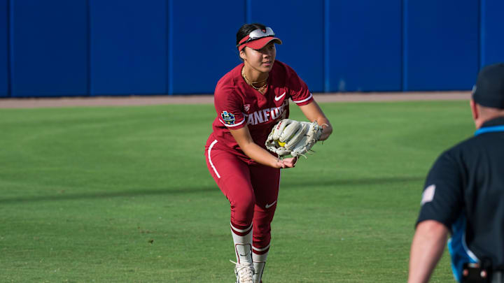 May 30, 2024; Oklahoma City, OK, USA; Stanford Cardinals outfielder Kyra Chan (8) makes an out in the first inning agains the Texas Longhorns during a Women's College World Series softball game at Devon Park. Mandatory Credit: Brett Rojo-Imagn Images