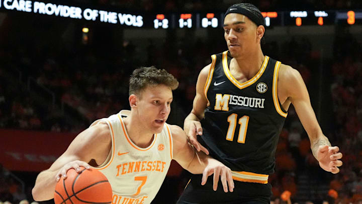 Tennessee's Igor Miličić Jr. (7) tries to get to the basket while guarded by Missouri's Trent Pierce (11) during an NCAA college basketball game on Wednesday, Feb. 5, 2025, in Knoxville, Tenn.