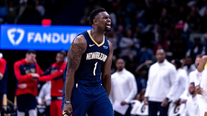 Jan 17, 2025; New Orleans, Louisiana, USA; New Orleans Pelicans forward Zion Williamson (1) reacts to dunking the ball through the arm of Utah Jazz forward Drew Eubanks (15) during the second half at Smoothie King Center. Mandatory Credit: Stephen Lew-Imagn Images Jan 17, 2025; New Orleans, Louisiana, USA; New Orleans Pelicans forward Zion Williamson (1) reacts to dunking the ball through the arm of Utah Jazz forward Drew Eubanks (15) during the second half at Smoothie King Center. Mandatory Credit: Stephen Lew-Imagn Images