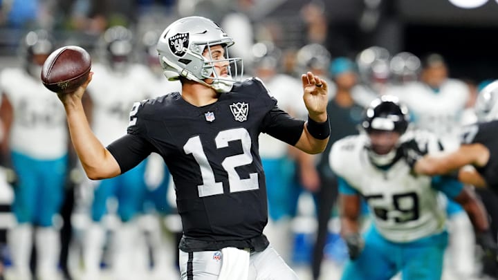 Dec 22, 2024; Paradise, Nevada, USA; Las Vegas Raiders quarterback Aidan O'Connell (12) looks to pass against the Jacksonville Jaguars during the third quarter at Allegiant Stadium. Mandatory Credit: Stephen R. Sylvanie-Imagn Images Dec 22, 2024; Paradise, Nevada, USA; Las Vegas Raiders quarterback Aidan O'Connell (12) looks to pass against the Jacksonville Jaguars during the third quarter at Allegiant Stadium. Mandatory Credit: Stephen R. Sylvanie-Imagn Images