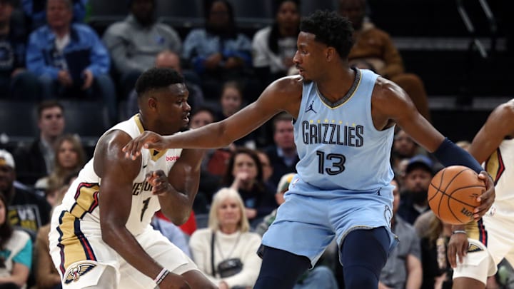 Feb 12, 2024; Memphis, Tennessee, USA; Memphis Grizzlies forward-center Jaren Jackson Jr. (13) handles the ball as New Orleans Pelicans forward Zion Williamson (1) defends during the second half at FedExForum. Mandatory Credit: Petre Thomas-Imagn Images Feb 12, 2024; Memphis, Tennessee, USA; Memphis Grizzlies forward-center Jaren Jackson Jr. (13) handles the ball as New Orleans Pelicans forward Zion Williamson (1) defends during the second half at FedExForum. Mandatory Credit: Petre Thomas-Imagn Images