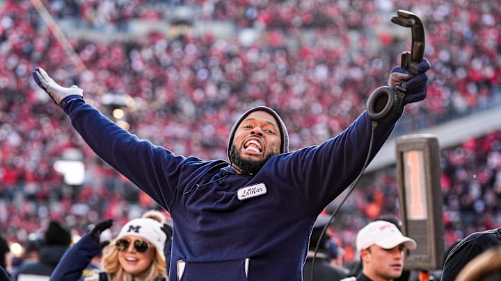 Michigan defensive backs coach LaMar Morgan celebrates 13-10 win over Ohio State at Ohio Stadium in Columbus, Ohio on Saturday, Nov. 30, 2024.