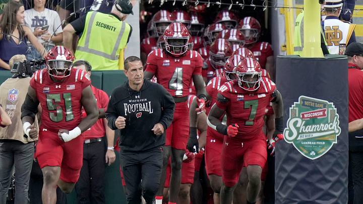 Wisconsin Badgers head coach Luke Fickell leads his team to the field Wisconsin Badgers head coach Luke Fickell leads his team to the field