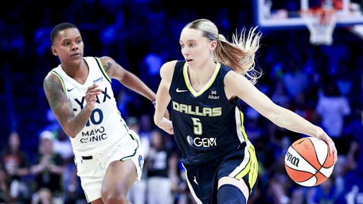 May 16, 2025; Arlington, Texas, USA; Dallas Wings guard Paige Bueckers (5) dribbles as Minnesota Lynx guard Courtney Williams (10) defends during the second half at College Park Center. Mandatory Credit: Kevin Jairaj-Imagn Images May 16, 2025; Arlington, Texas, USA; Dallas Wings guard Paige Bueckers (5) dribbles as Minnesota Lynx guard Courtney Williams (10) defends during the second half at College Park Center. Mandatory Credit: Kevin Jairaj-Imagn Images