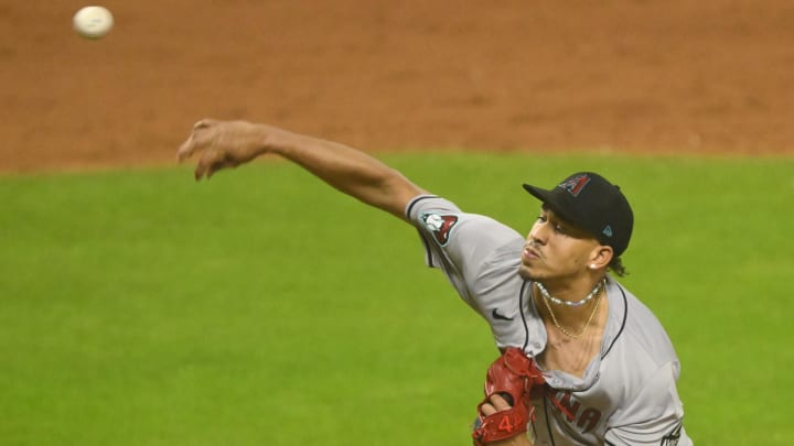 Aug 5, 2024; Cleveland, Ohio, USA; Arizona Diamondbacks relief pitcher Justin Martinez (63) delivers a pitch in the tenth inning against the Cleveland Guardians at Progressive Field. Mandatory Credit: David Richard-USA TODAY Sports Aug 5, 2024; Cleveland, Ohio, USA; Arizona Diamondbacks relief pitcher Justin Martinez (63) delivers a pitch in the tenth inning against the Cleveland Guardians at Progressive Field. Mandatory Credit: David Richard-USA TODAY Sports