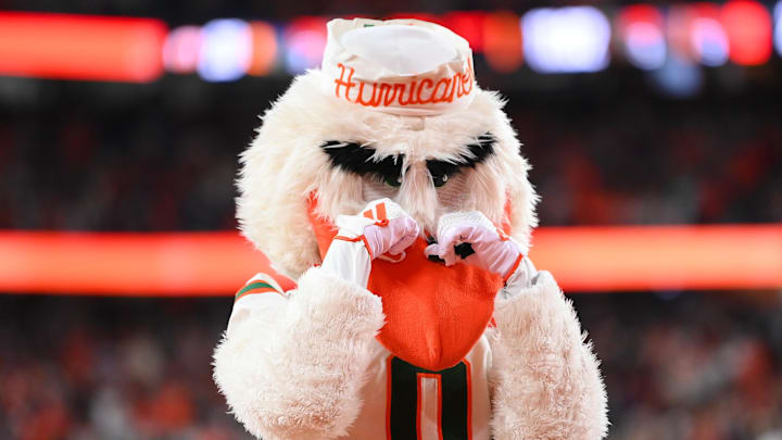 Nov 30, 2024; Syracuse, New York, USA; Miami Hurricanes mascot Sebastian gestures to fans against the Syracuse Orange during the second half at the JMA Wireless Dome. Mandatory Credit: Rich Barnes-Imagn Images