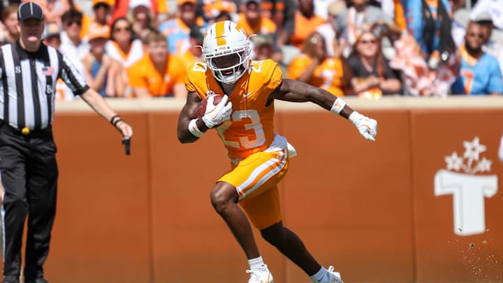 Sep 20, 2025; Knoxville, Tennessee, USA; Tennessee Volunteers defensive back Boo Carter (23) returns a punt against the UAB Blazers during the first quarter at Neyland Stadium. Mandatory Credit: Randy Sartin-Imagn Images Sep 20, 2025; Knoxville, Tennessee, USA; Tennessee Volunteers defensive back Boo Carter (23) returns a punt against the UAB Blazers during the first quarter at Neyland Stadium. Mandatory Credit: Randy Sartin-Imagn Images