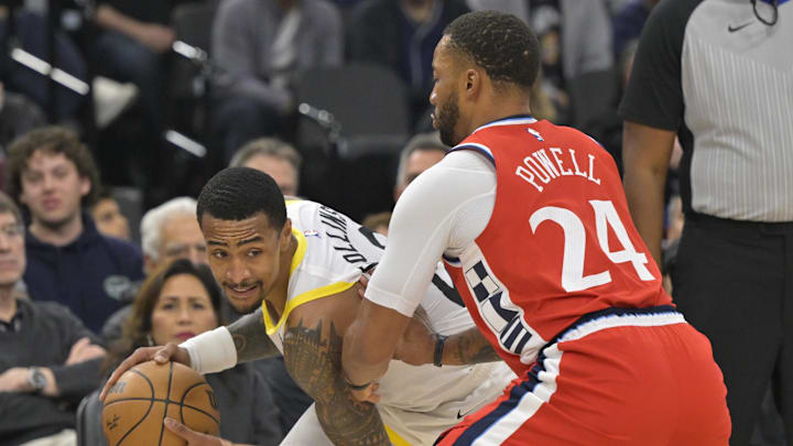 Dec 16, 2024; Inglewood, California, USA;  Utah Jazz forward John Collins (20) is defended by Los Angeles Clippers guard Norman Powell (24) in the first half at Intuit Dome. Mandatory Credit: Jayne Kamin-Oncea-Imagn Images