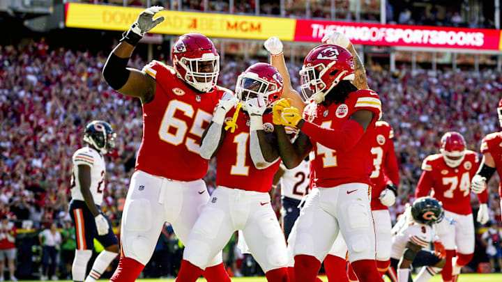 Trey Smith (65) celebrates with Jerick McKinnon after a touchdown against the Bears.