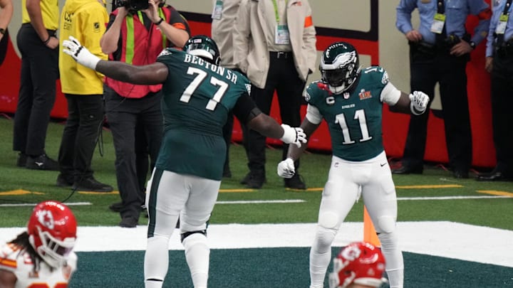 Feb 9, 2025; New Orleans, LA, USA; Philadelphia Eagles wide receiver A.J. Brown (11) reacts with offensive tackle Mekhi Becton (77) after making a touchdown catch against the Kansas City Chiefs during the second quarter in Super Bowl LIX at Caesars Superdome. Mandatory Credit: Kirby Lee-Imagn Images Feb 9, 2025; New Orleans, LA, USA; Philadelphia Eagles wide receiver A.J. Brown (11) reacts with offensive tackle Mekhi Becton (77) after making a touchdown catch against the Kansas City Chiefs during the second quarter in Super Bowl LIX at Caesars Superdome. Mandatory Credit: Kirby Lee-Imagn Images