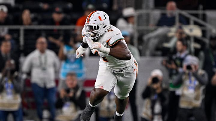Dec 31, 2025; Arlington, TX, USA; Miami Hurricanes defensive lineman Rueben Bain Jr. (4) rushes the line during the 2025 Cotton Bowl and quarterfinal game of the College Football Playoff at AT&T Stadium. Mandatory Credit: Jerome Miron-Imagn Images Dec 31, 2025; Arlington, TX, USA; Miami Hurricanes defensive lineman Rueben Bain Jr. (4) rushes the line during the 2025 Cotton Bowl and quarterfinal game of the College Football Playoff at AT&T Stadium. Mandatory Credit: Jerome Miron-Imagn Images