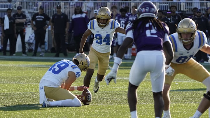 Sep 27, 2025; Evanston, Illinois, USA; UCLA Bruins place kicker Mateen Bhaghani (94) kicks a field goal against the Northwestern Wildcats during the second half at Northwestern Medicine Field at Martin Stadium. Mandatory Credit: David Banks-Imagn Images Sep 27, 2025; Evanston, Illinois, USA; UCLA Bruins place kicker Mateen Bhaghani (94) kicks a field goal against the Northwestern Wildcats during the second half at Northwestern Medicine Field at Martin Stadium. Mandatory Credit: David Banks-Imagn Images