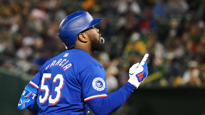 Texas Rangers right fielder Adolis Garcia (53) gestures after hitting a two-run home run against the Oakland Athletics during the third inning at Oakland-Alameda County Coliseum in 2024. Texas Rangers right fielder Adolis Garcia (53) gestures after hitting a two-run home run against the Oakland Athletics during the third inning at Oakland-Alameda County Coliseum in 2024.