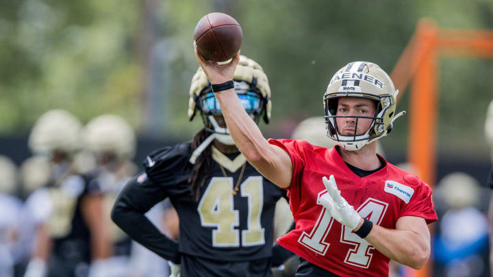 Jun 13, 2023; New Orleans, LA, USA; New Orleans Saints quarterback Jake Haener (14) passes the ball during minicamp at the Ochsner Sports Performance Center. Mandatory Credit: Stephen Lew-USA TODAY Sports