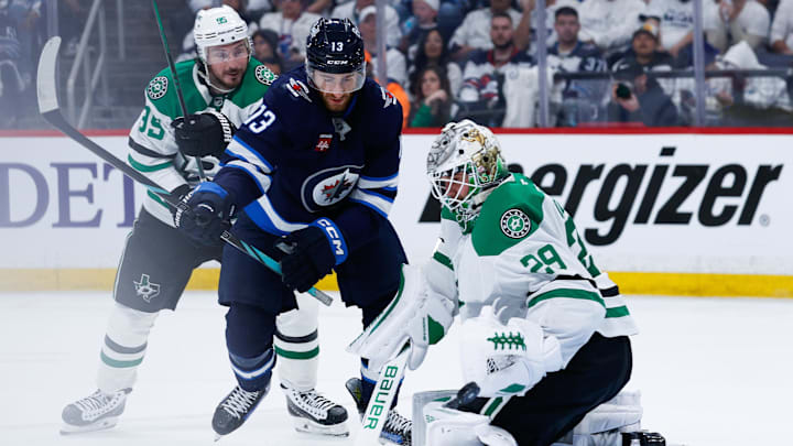 May 15, 2025; Winnipeg, Manitoba, CAN; Dallas Stars goalie Jake Oettinger (29) makes a save as Winnipeg Jets forward Gabriel Vilardi (13) looks for a rebound during the second period in game five of the second round of the 2025 Stanley Cup Playoffs at Canada Life Centre. Mandatory Credit: Terrence Lee-Imagn Images